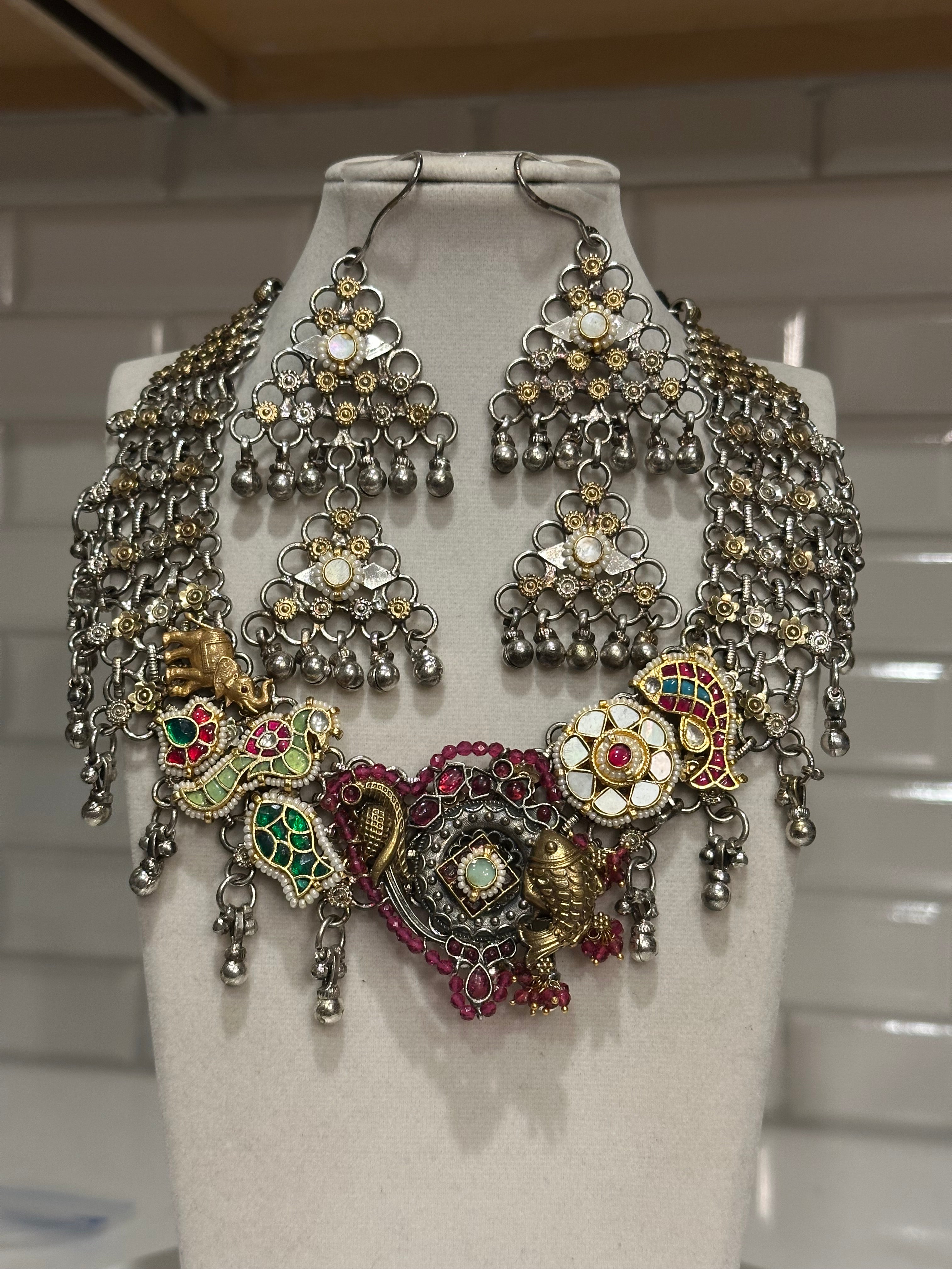 Premium Quality Silver Replica Necklace with pachi kundan embellishments. Wear in two ways. Two earrings attached