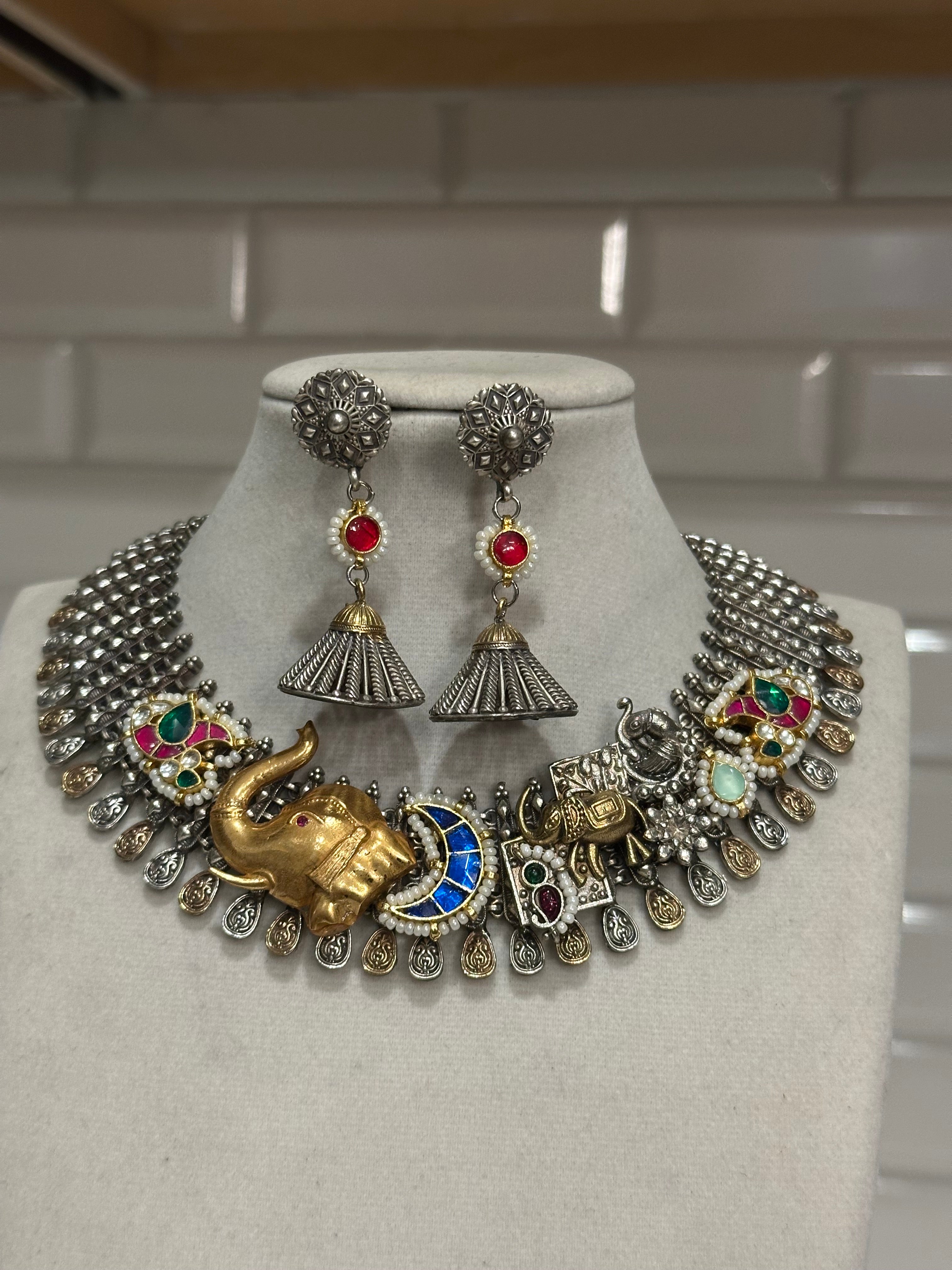 Premium quality dual tone silver lookalike necklace with elephant embellishments