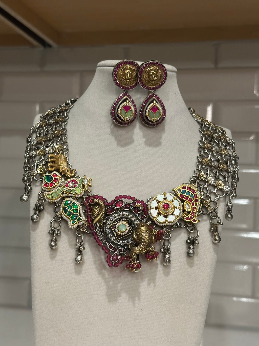 Premium Quality Silver Replica Necklace with pachi kundan embellishments. Wear in two ways. Two earrings attached