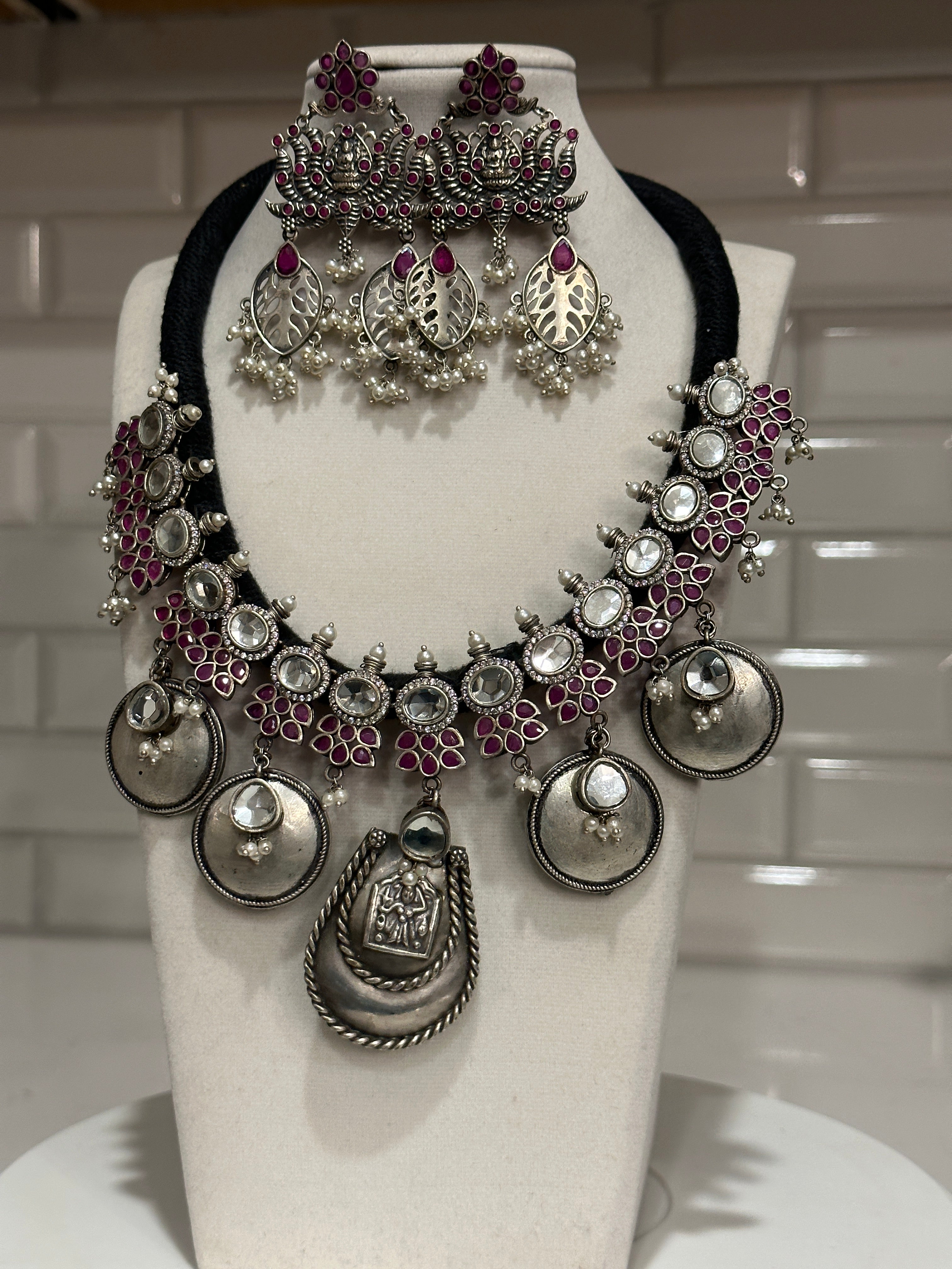 Silver lookalike with kundan stones